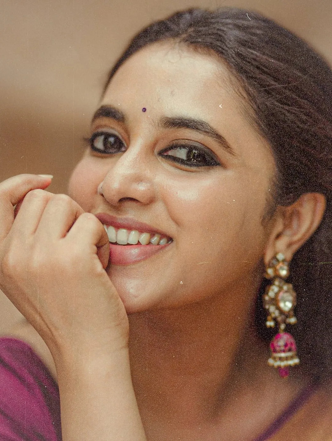 Close Up of Priyanka Mohan with Her Hand on Her Chin Image