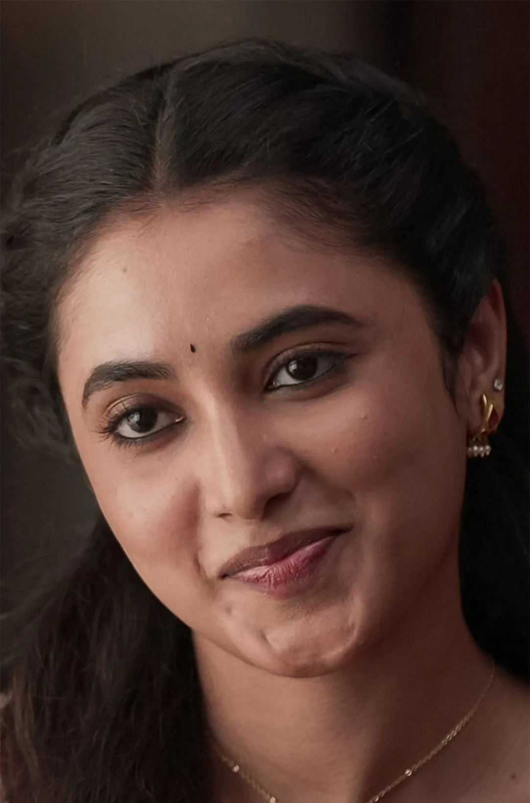 Close Up Wallpaper of Priyanka Mohan with a Cute Smile