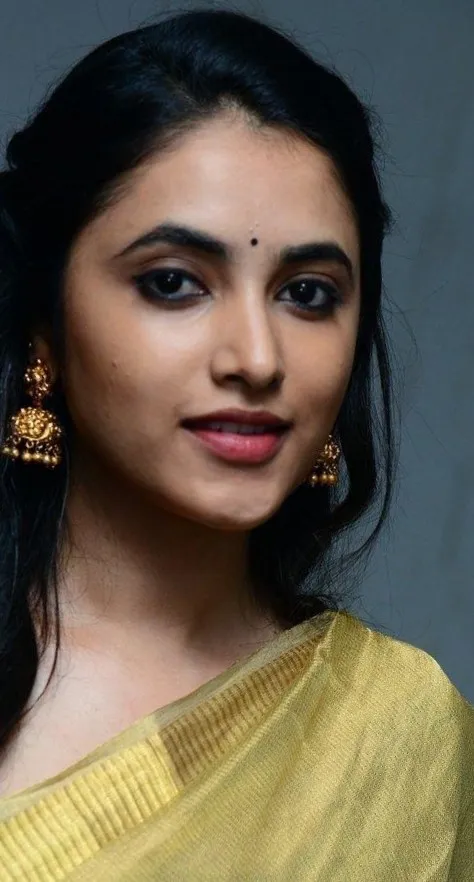 Confident Expression of Priyanka Arul Mohan in Yellow image