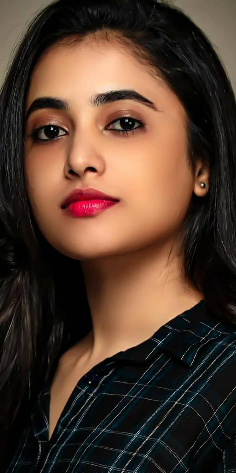 Confident Priyanka in checkered dress with bold lips image