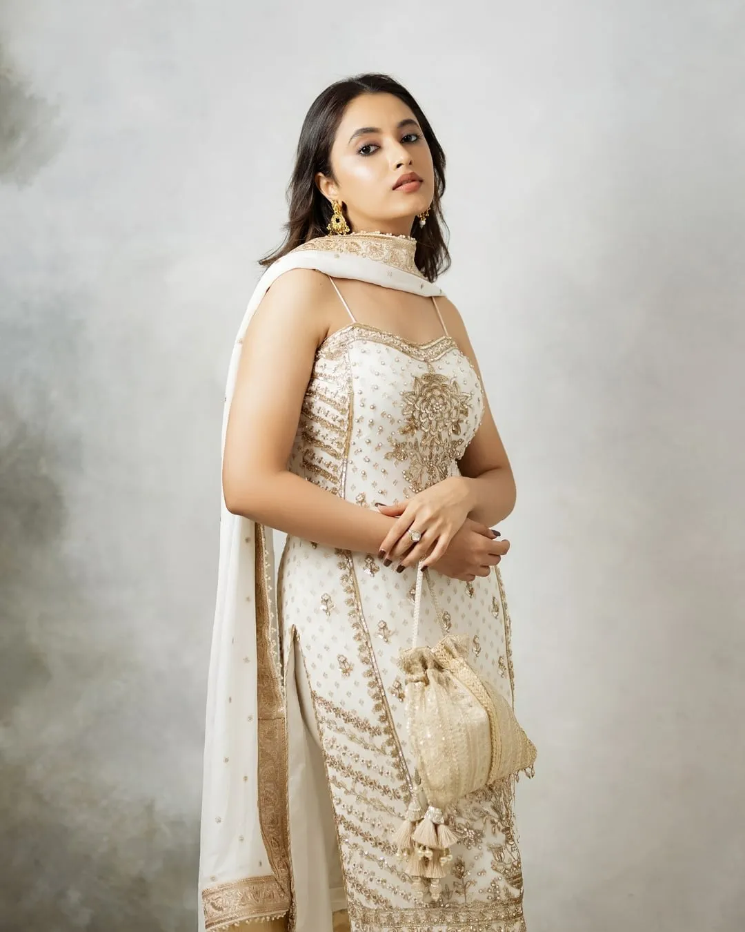 Elegant Priyanka Arul Mohan posing in cream ethnic set image