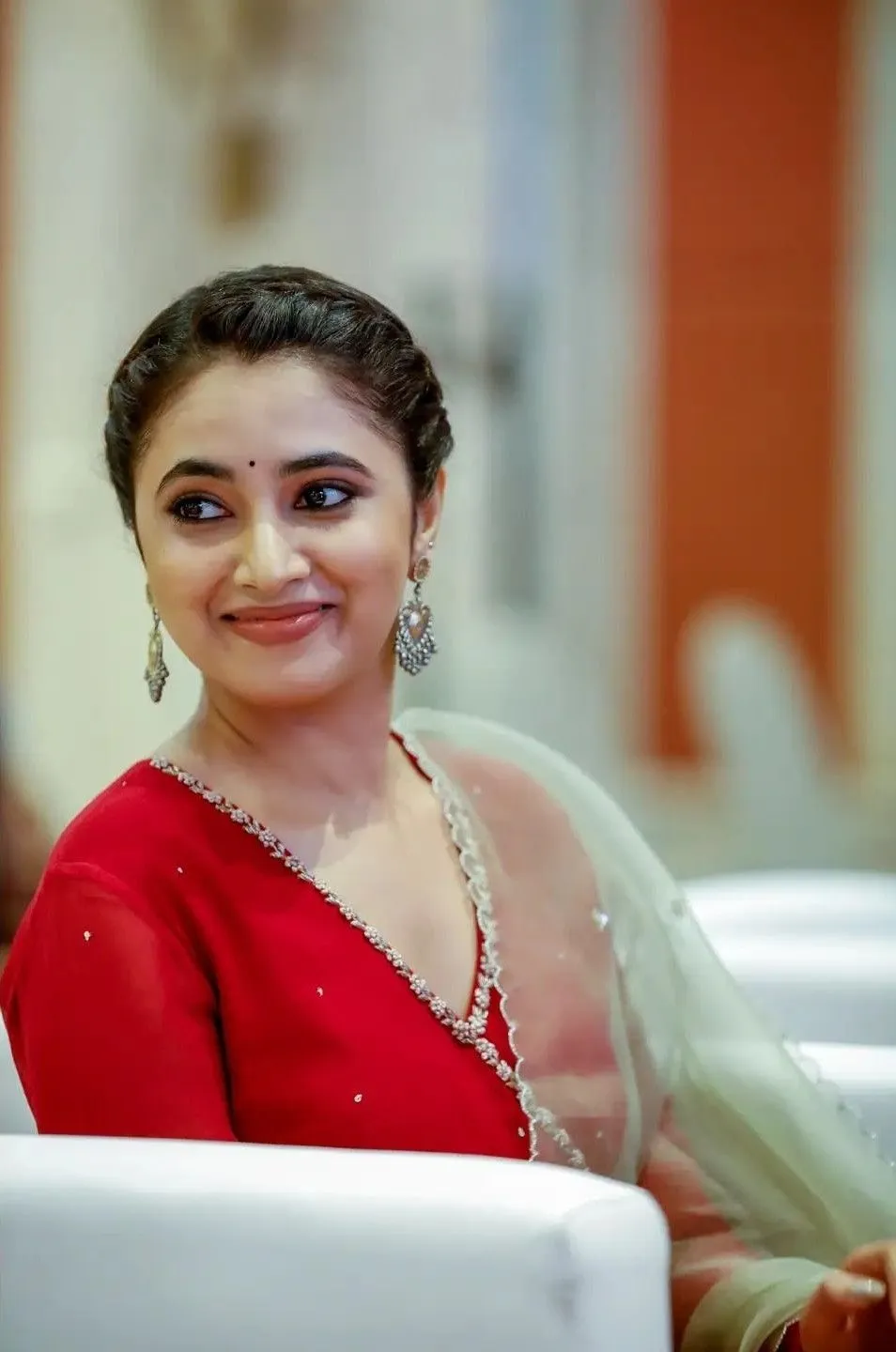 Elegant Smile of Priyanka Arul Mohan in Red Outfit Wallpaper