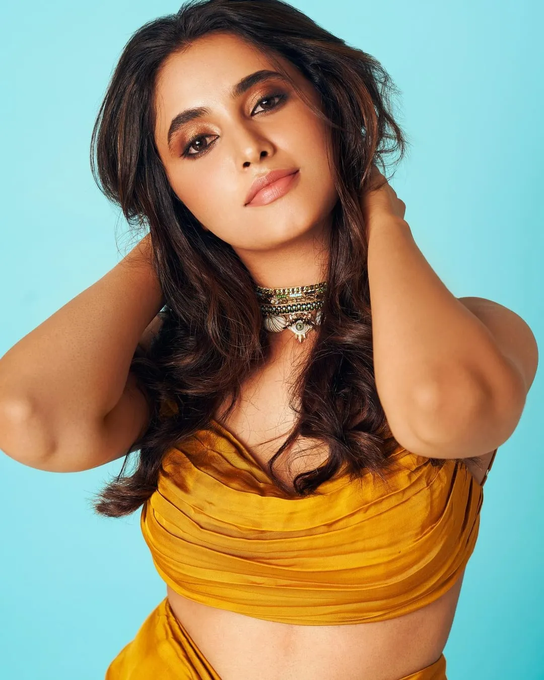 Hot Image of Priyanka Mohan in Yellow Dress Hand on Hair