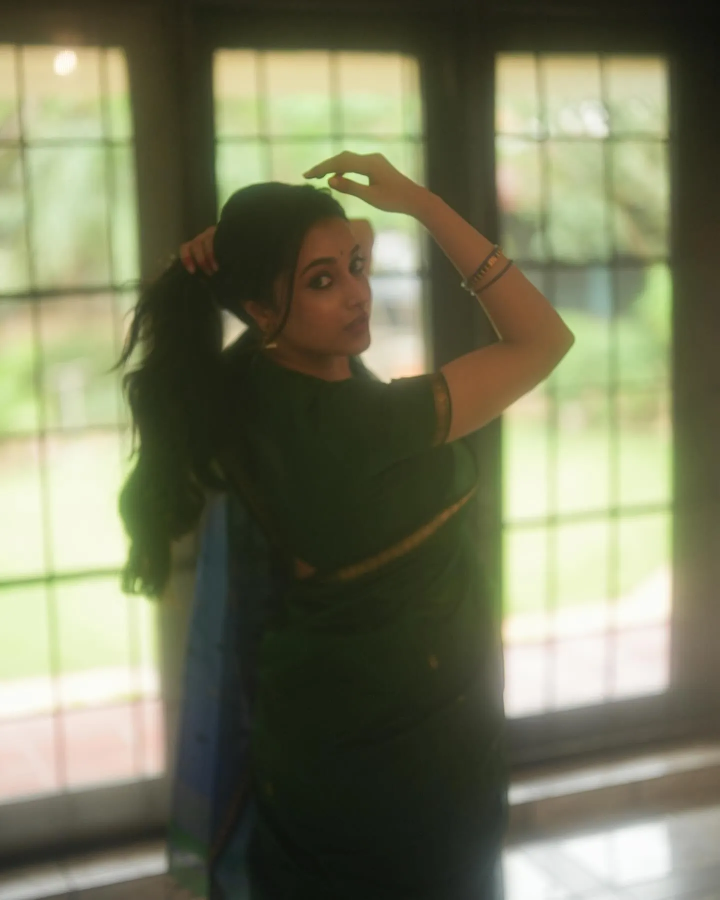 Priyanka Arul Mohan by Window in Teal Green Saree Wallpaper
