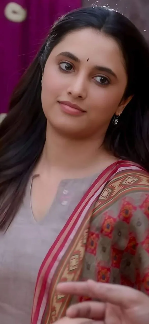 Priyanka Arul Mohan calm expression in grey dress image