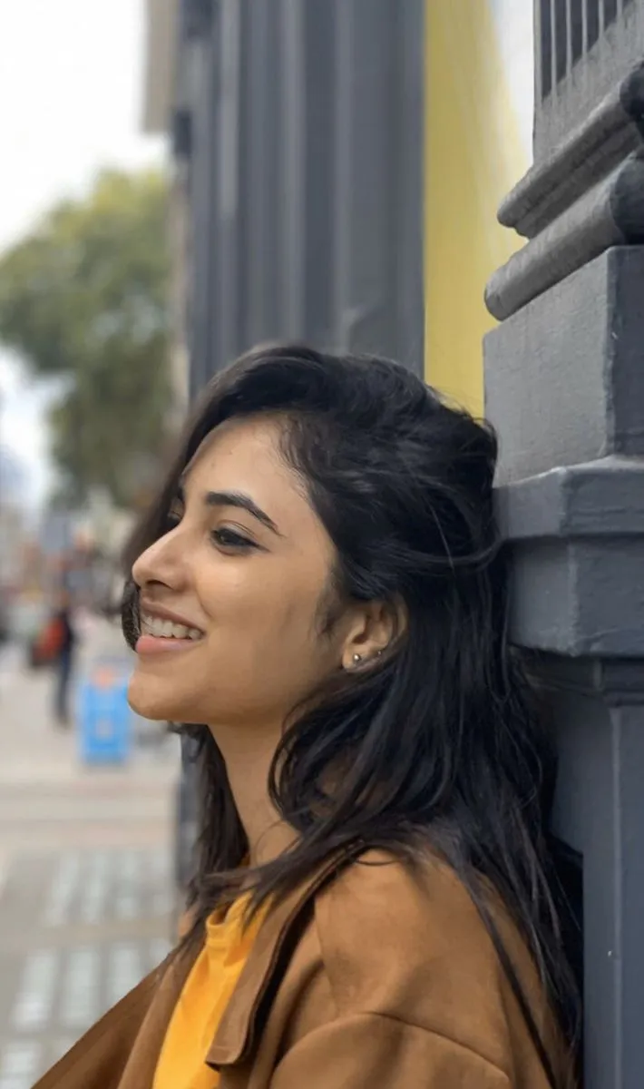 Priyanka Arul Mohan Casual Look Leaning on Wall Wallpaper