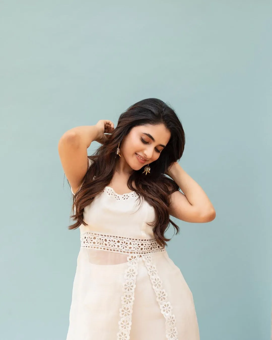 Priyanka Arul Mohan Charming in White Dress Posing Naturally