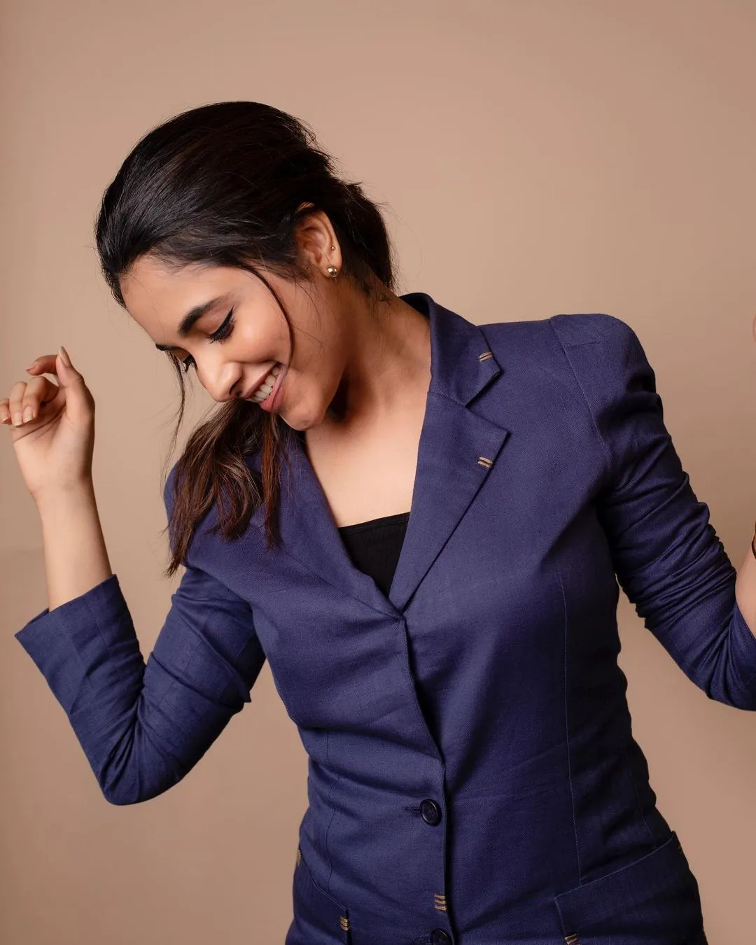 Priyanka Arul Mohan Dancing Joyfully in Blue Blazer image