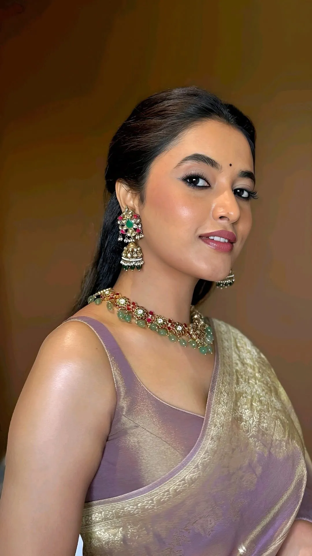 Priyanka Arul Mohan in an Elegant Purple Saree with Jewelry