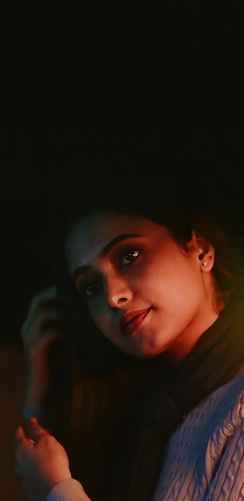 Priyanka Arul Mohan in Dark light with thoughtful expression