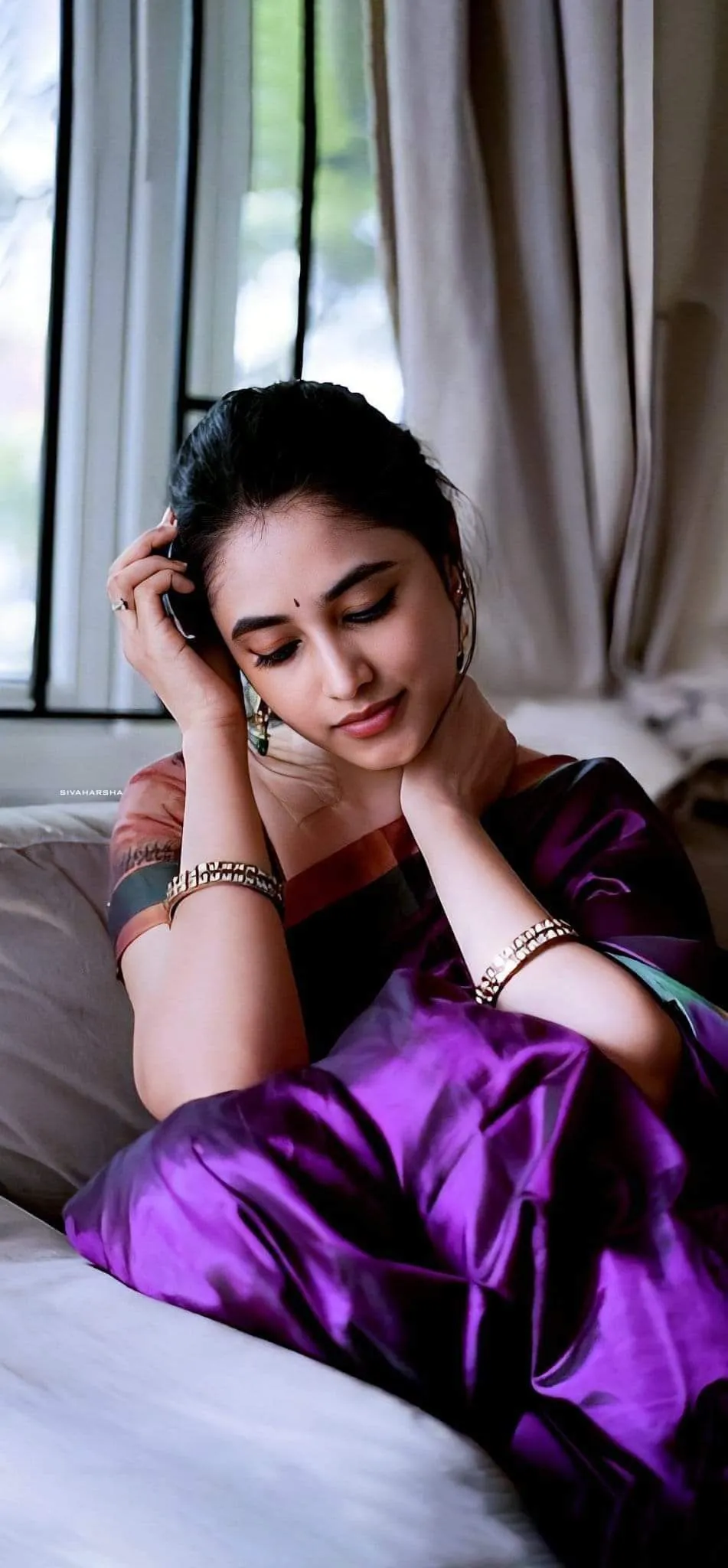 Priyanka Arul Mohan in Deep Purple Dress with Relaxed Pose