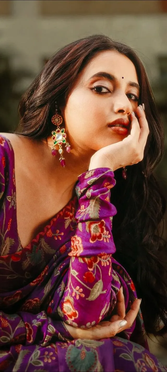 Priyanka Arul Mohan in Floral Dress with Gentle pose image