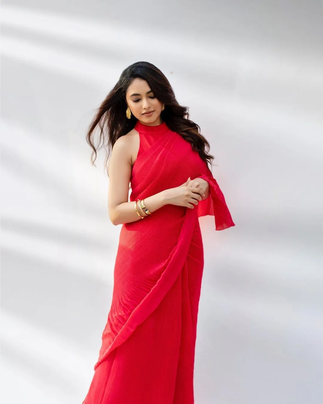 Priyanka Arul Mohan in Flowing Red Dress Outdoors Wallpaper