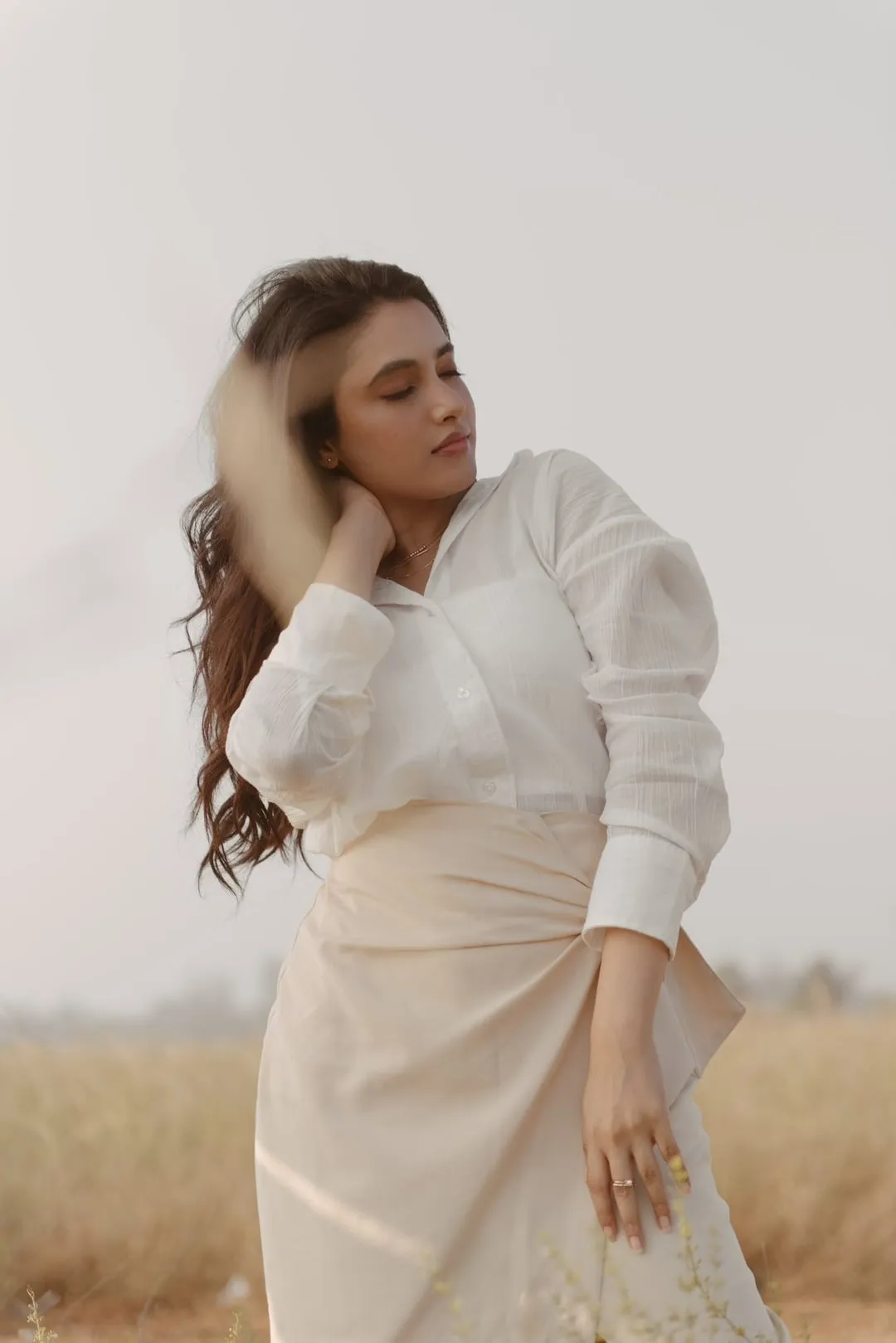 Priyanka Arul Mohan in Flowing White Dress in Fields image