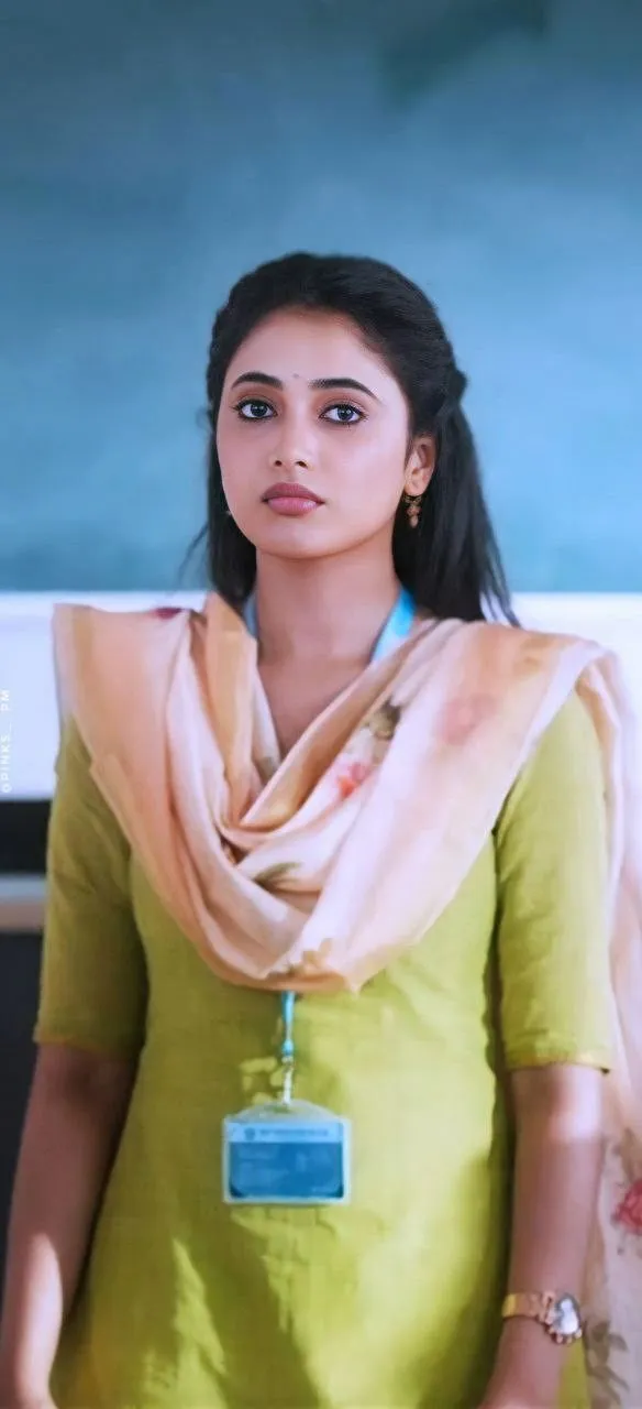 Priyanka Arul Mohan in Professional Look with Yellow Outfit