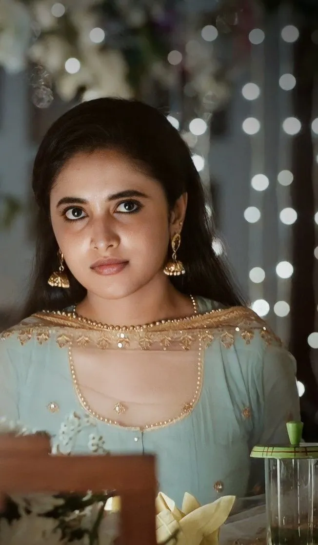 Priyanka Arul Mohan in soft light with reflective mood image