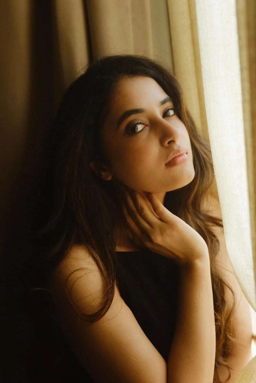 Priyanka Arul Mohan in stylish Outfit Looking Out the Window
