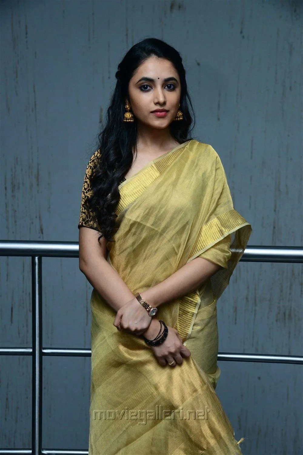 Priyanka Arul Mohan in Stylish Yellow Saree near Staircase