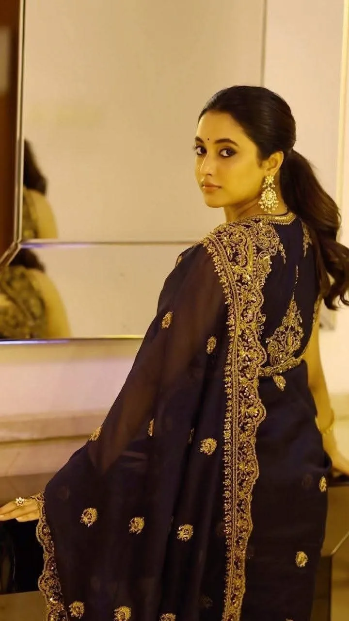 Priyanka Arul Mohan in Traditional Look with purple saree