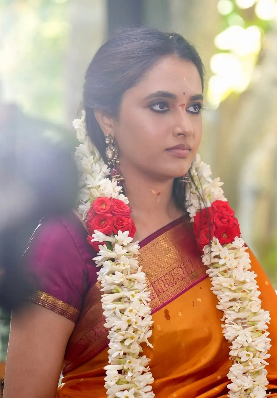 Priyanka Arul Mohan in Traditional Red Saree with Garland