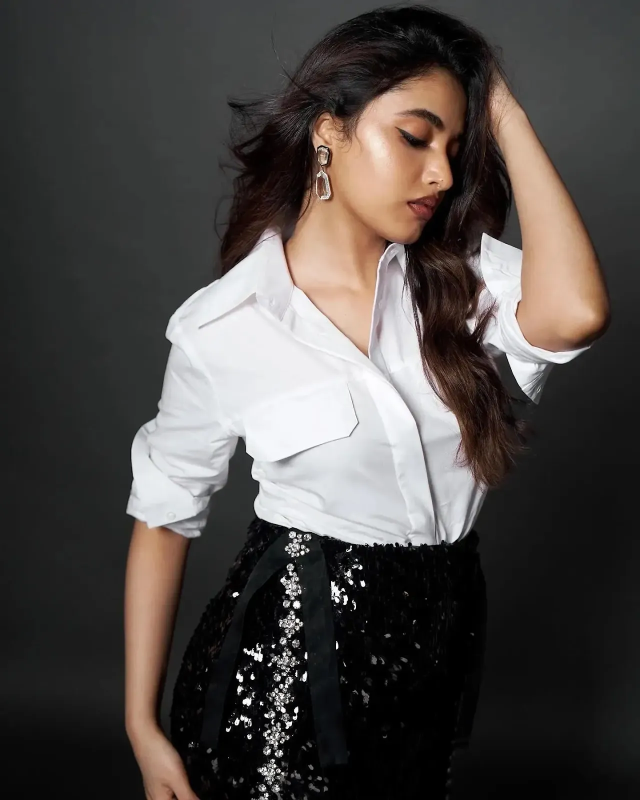 Priyanka Arul Mohan in White Shirt and Black Skirt Wallpaper