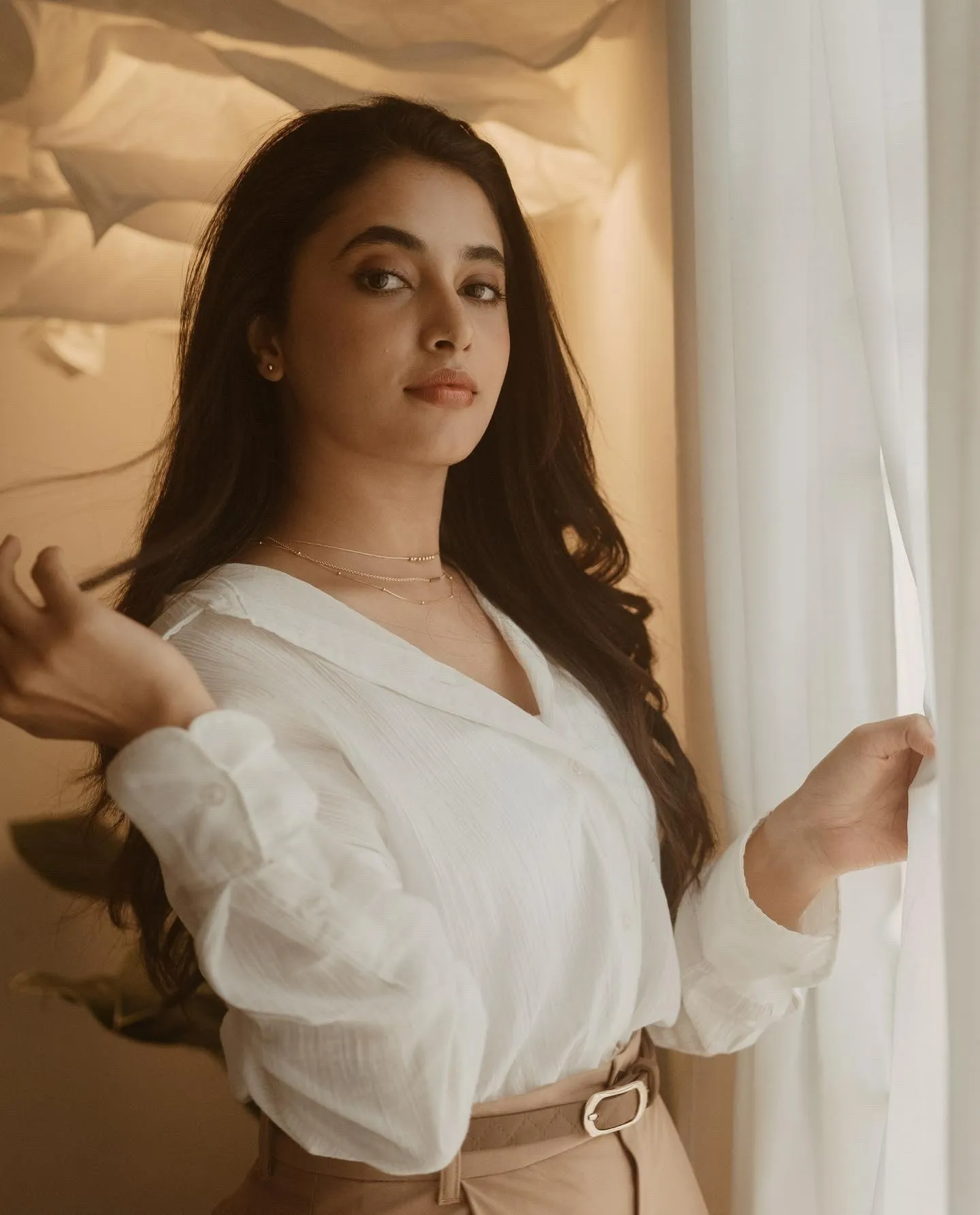 Priyanka Arul Mohan in White Top Near the Window Light image
