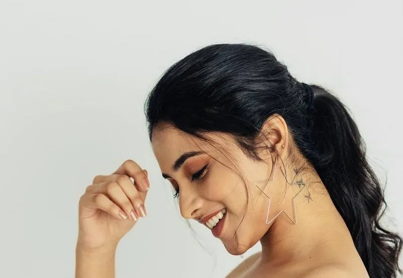 Priyanka Arul Mohan Joyful Moment in Minimal White Dress