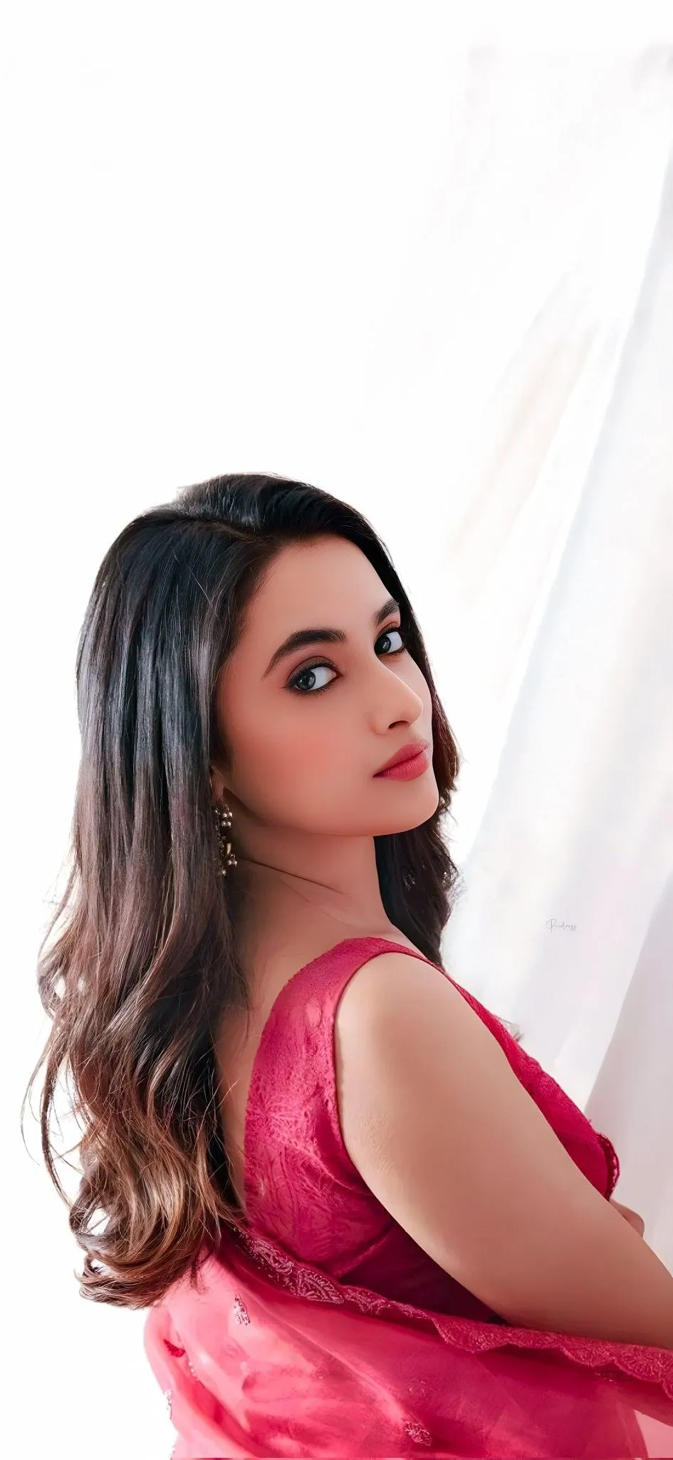 Priyanka Arul Mohan Posing Gracefully in Red Outfit image