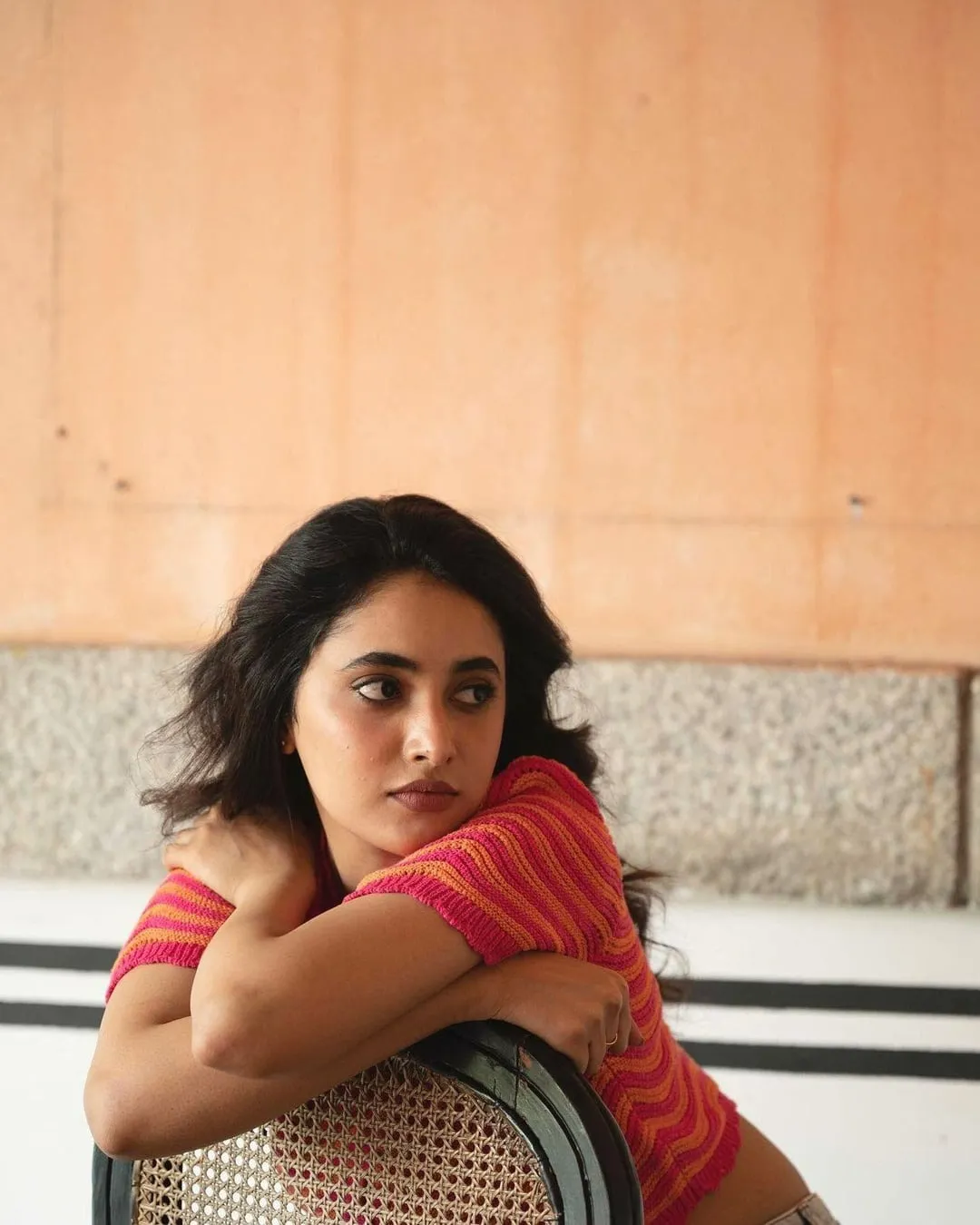 Priyanka Arul Mohan Posing Thoughtfully in Red Outfit image
