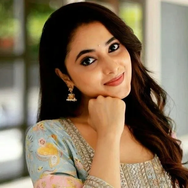 Priyanka Arul Mohan Radiant Smile in Elegant Light Dress