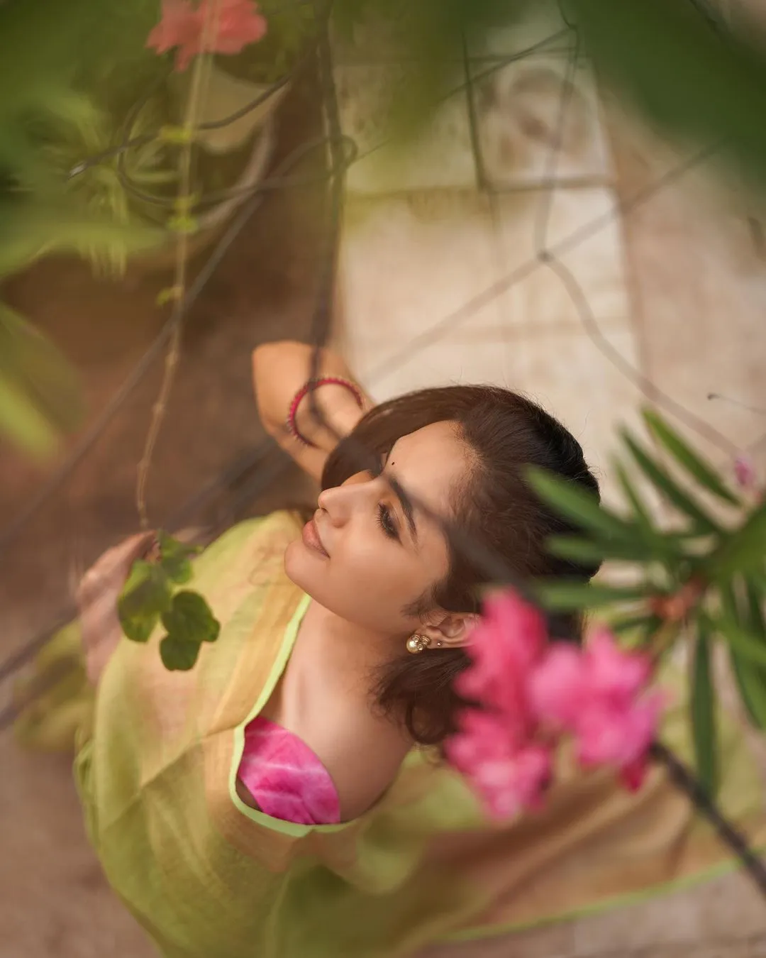 Priyanka Arul Mohan Relaxed Natural Pose in Green Saree