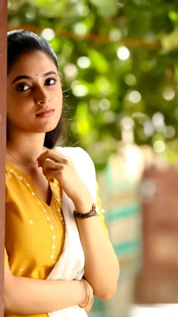 Priyanka Arul Mohan Relaxed Yellow Outfit in Garden View