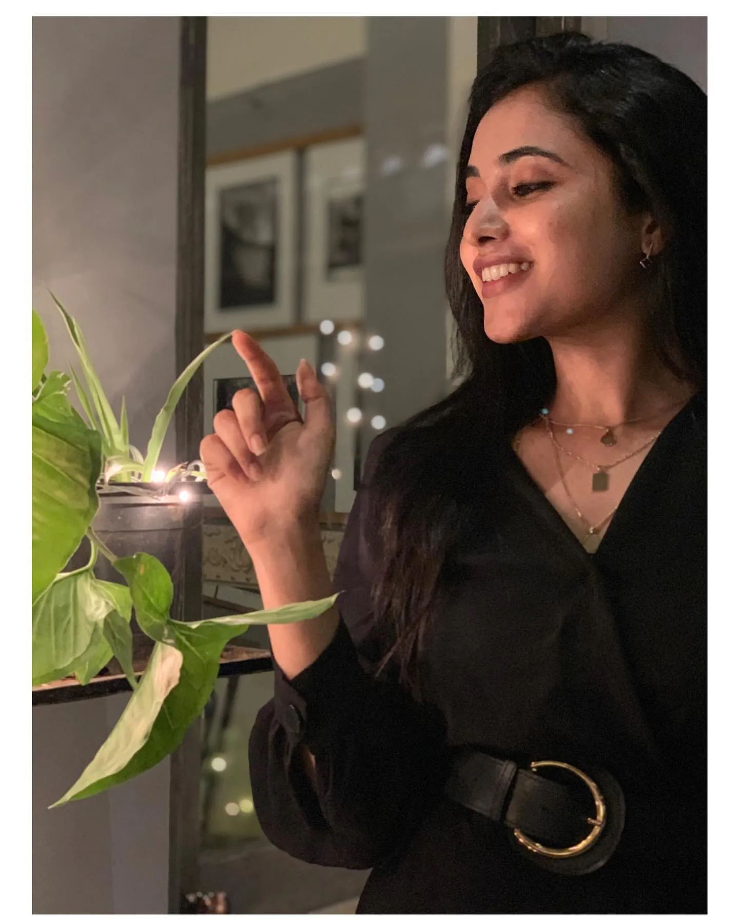 Priyanka Arul Mohan Smiling in an Elegant Black Dress image