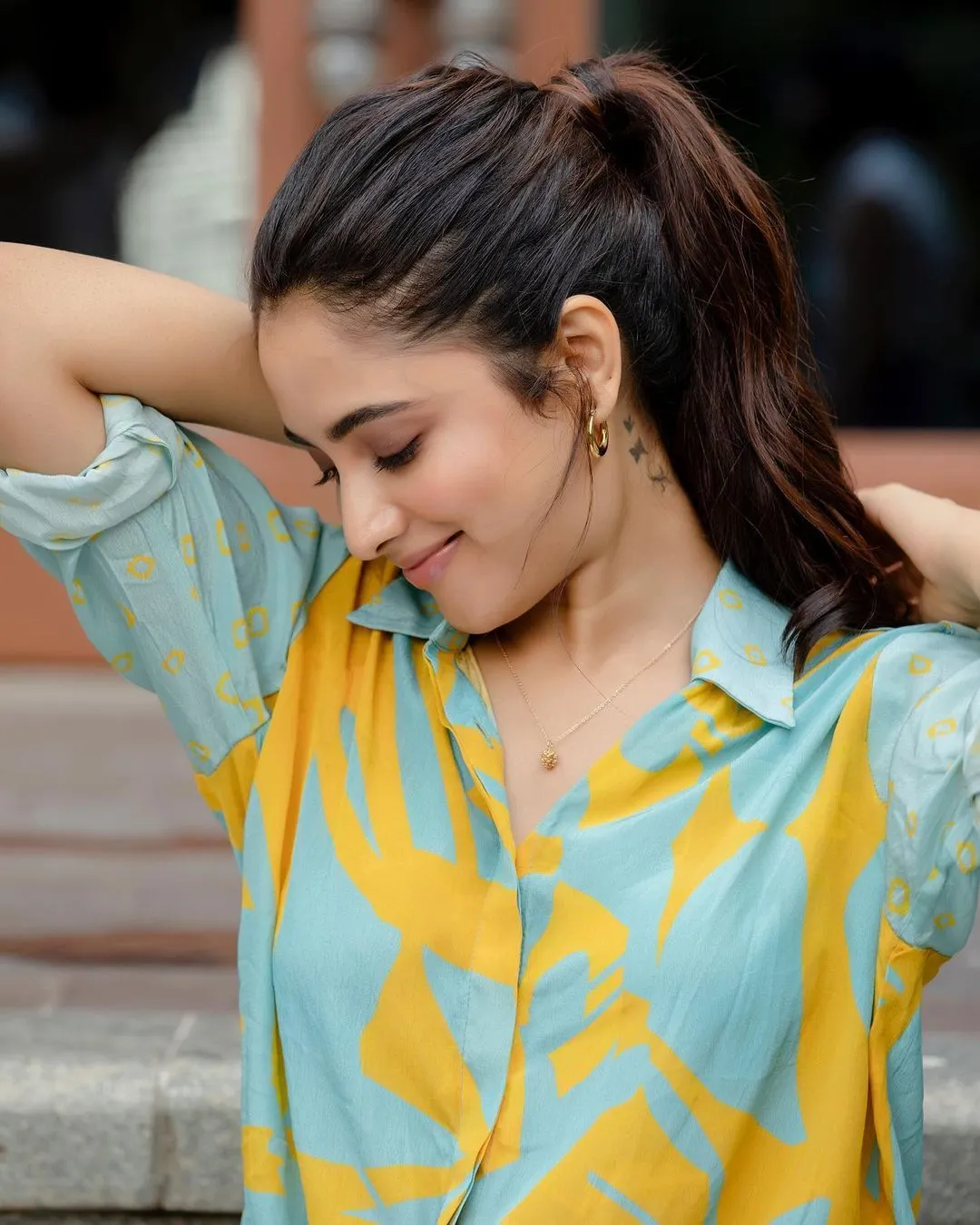 Priyanka Arul Mohan Smiling in Casual Yellow blue Outfit