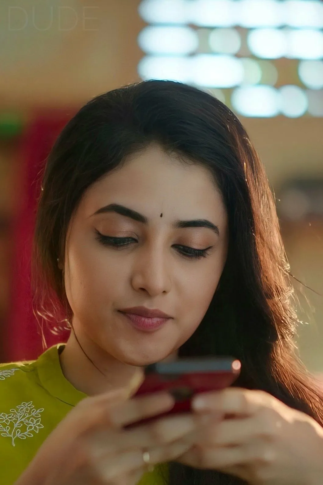 Priyanka Arul Mohan Smiling While Using Phone HD Wallpaper