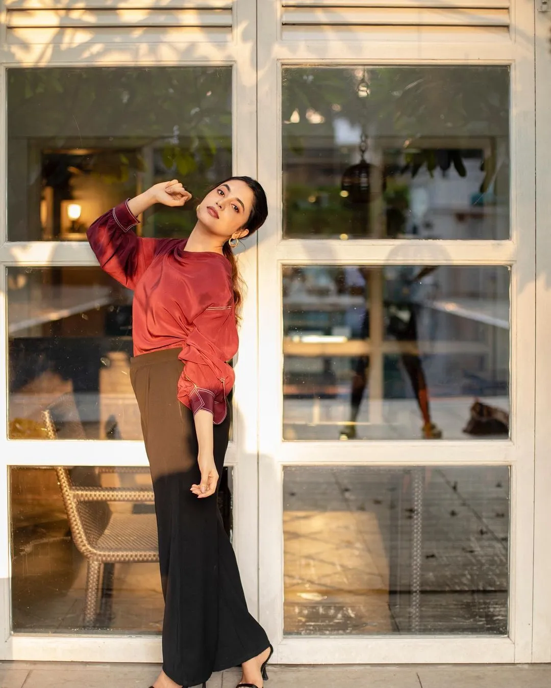 Priyanka Arul Mohan Stretching in Red Shirt and Black Pants