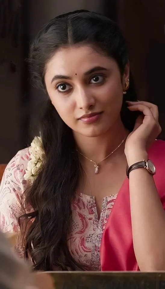 Priyanka Arul Mohan thoughtful expression in soft pink attire