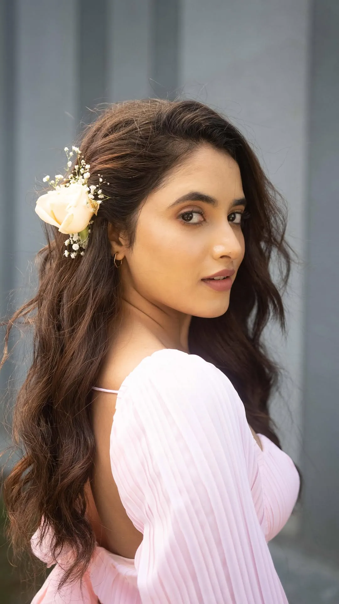 Priyanka Arul Mohan with Flower Bun in White Outfit image