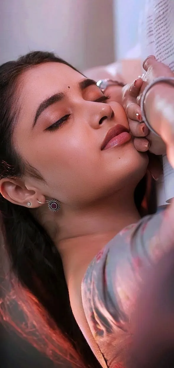 Priyanka eyes closed head tilted while posing HD image