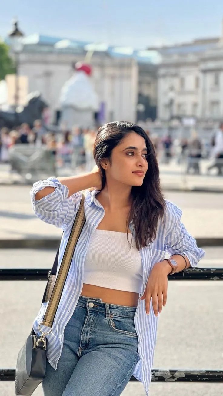 Priyanka in casual jeans and jacket exploring outside image