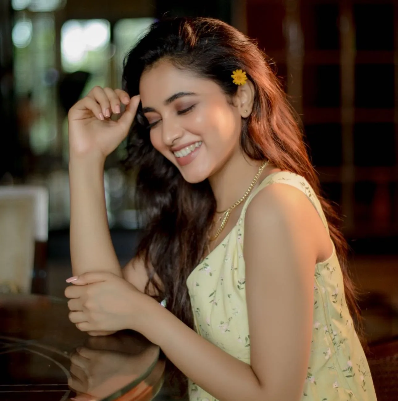 Priyanka laughing in sleeveless pastel dress Wallpaper