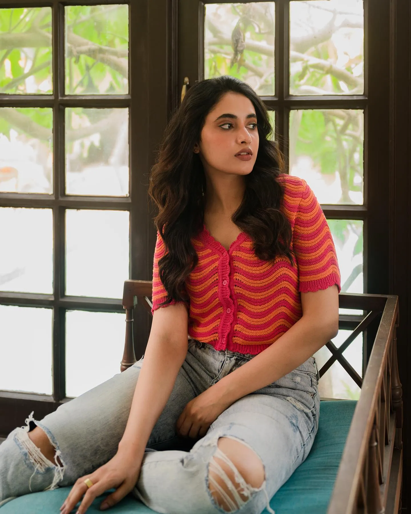 Priyanka Mohan in a Colourful Top And Scratch Jeans Image