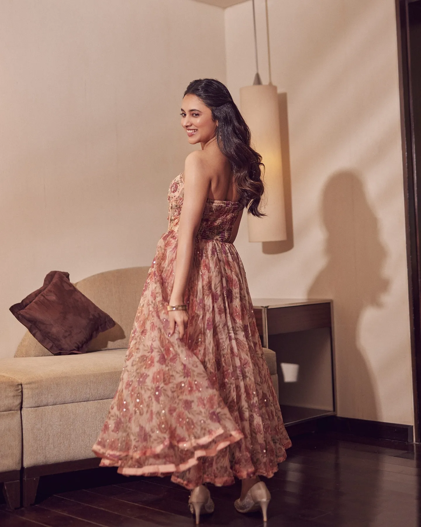 Priyanka Mohan in a Floral Maxi Dress Standing Near the Sofa
