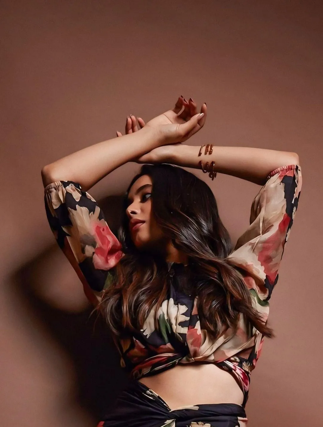 Priyanka Mohan in a Floral Top Standing in the Stdio Wall