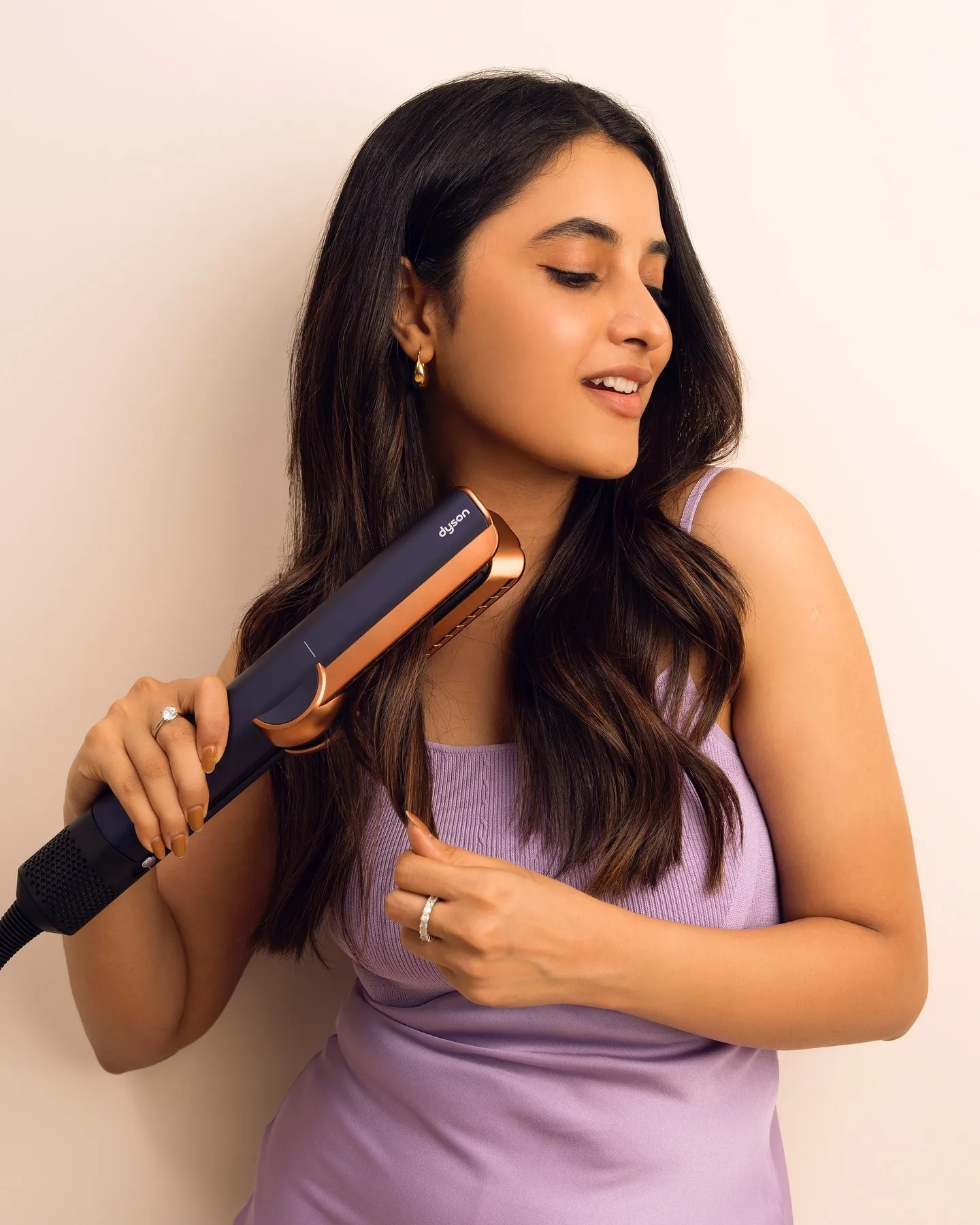 Priyanka Mohan in a Lanvander Dress with a Hair Straightener