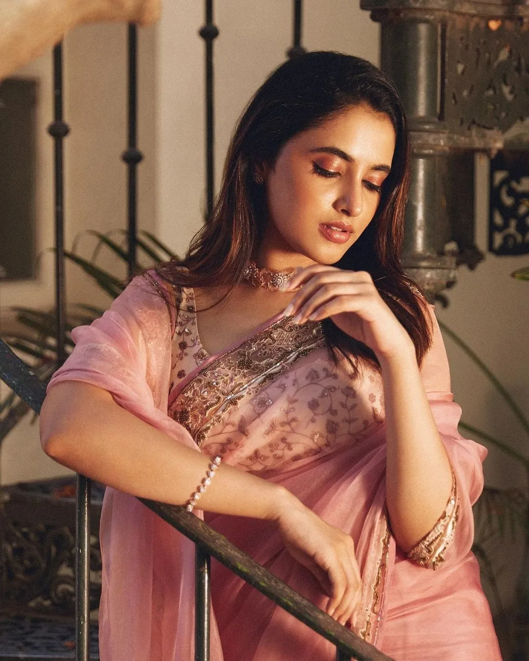 Priyanka Mohan in a Pink Saree with a Looking Down Pose