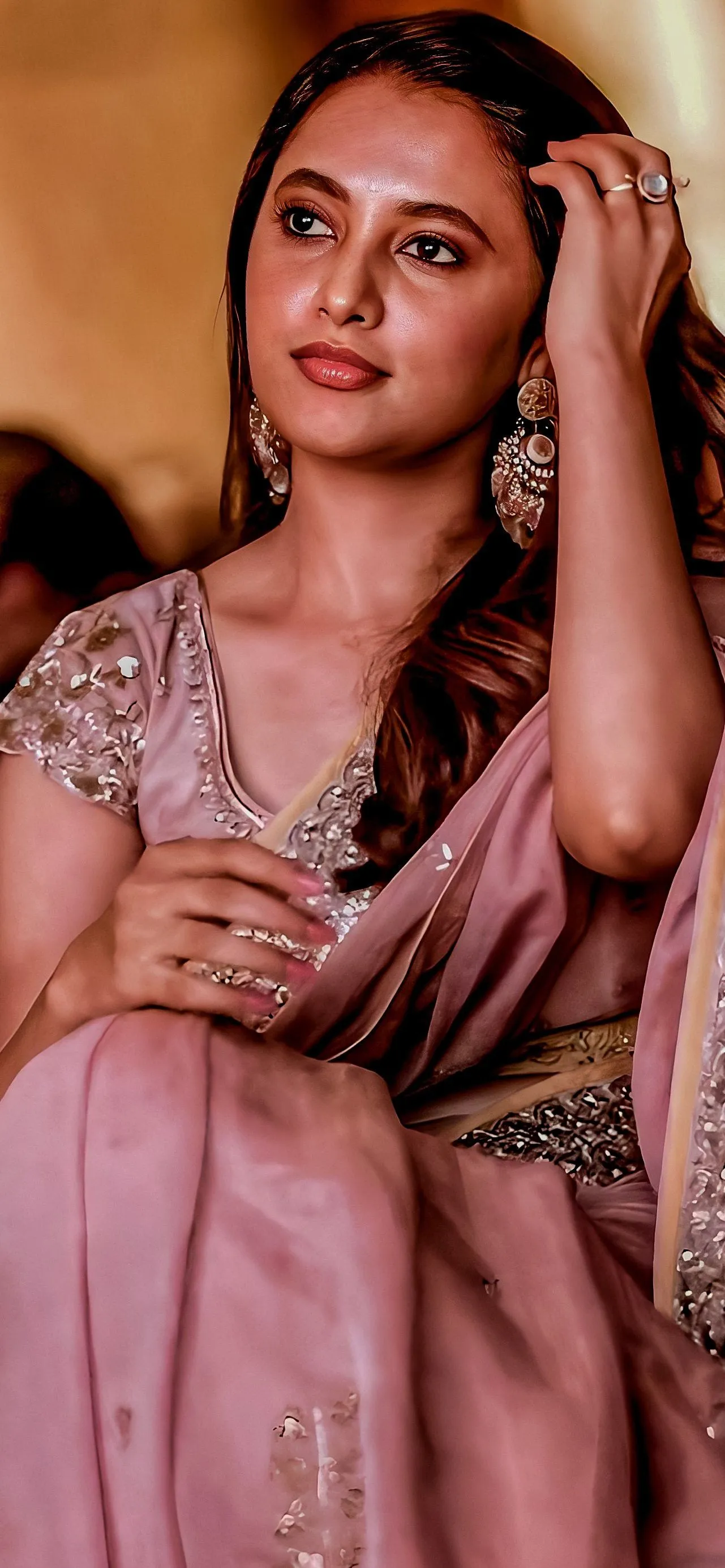 Priyanka Mohan in a Pink Saree with Her Hand on Her Hair