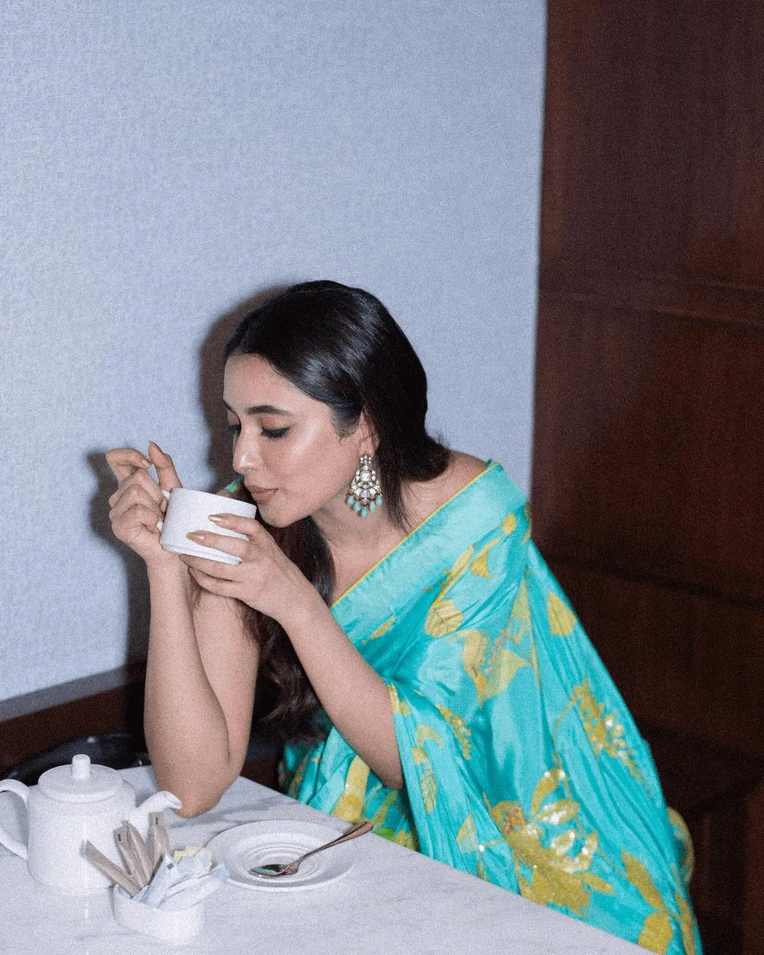 Priyanka Mohan in a Powder Blue Saree Drinking Coffee