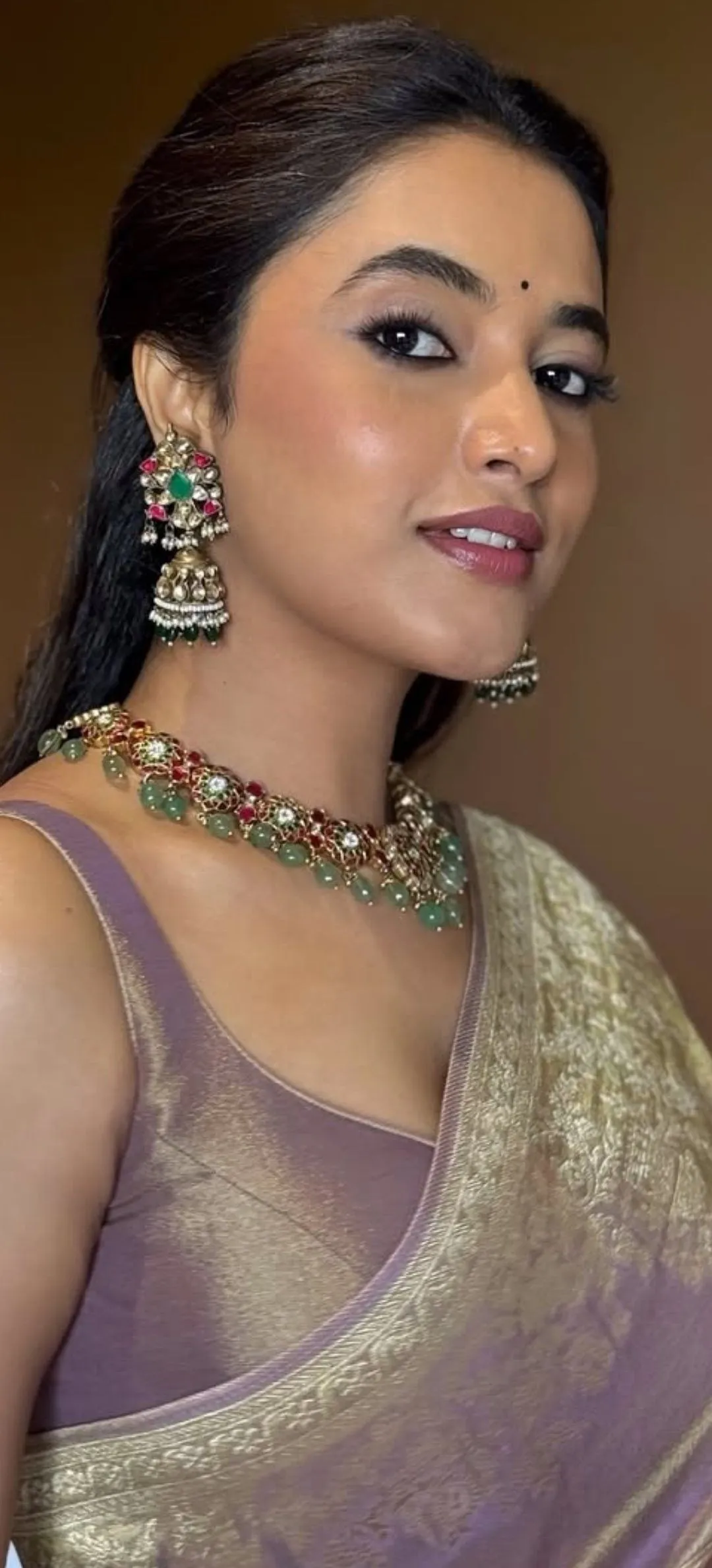 Priyanka Mohan in a Purple Saree And Looking at the Camera