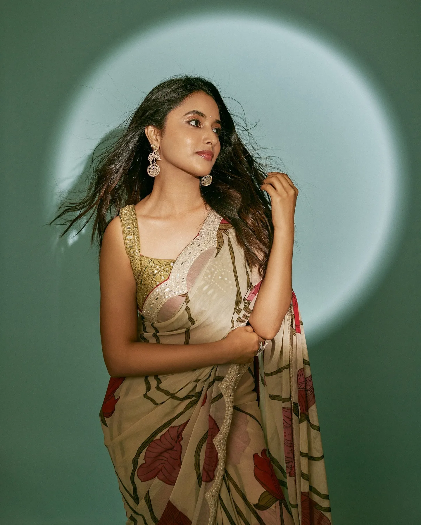 Priyanka Mohan in a Traditional Saree Standing Near Wall